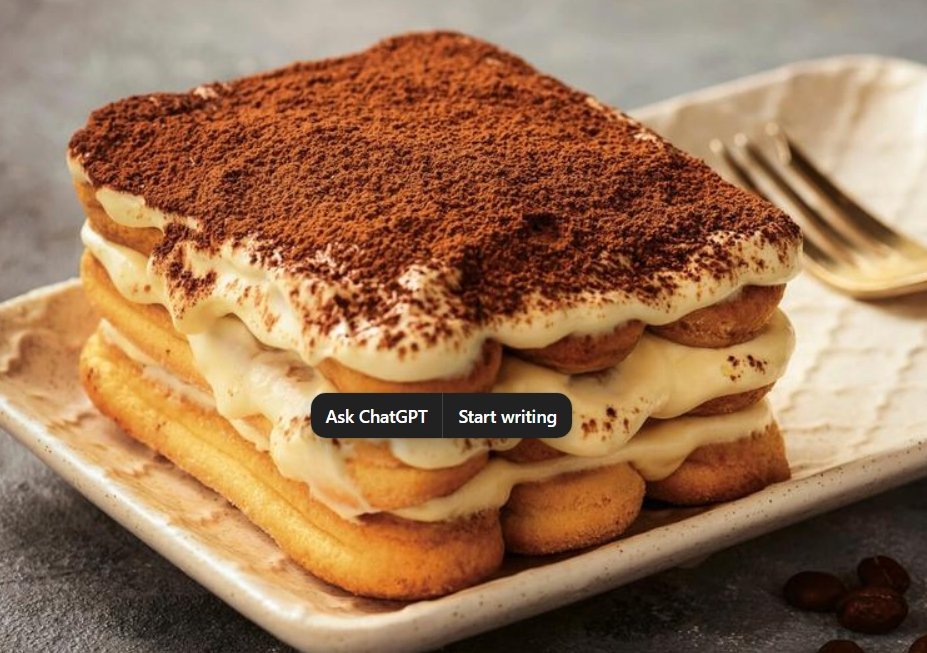 Tiramisu truyền thống với lớp kem mascarpone và ladyfinger.